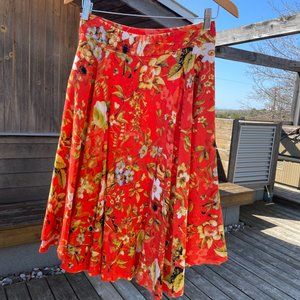 Circular skirt, linen, flowers patterne on bright orange, Premise, size 4.